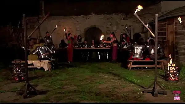 A Medieval Collective Sexual Gathering Takes Place In The Vicinity Of A Castle Under The Celestial Canopy